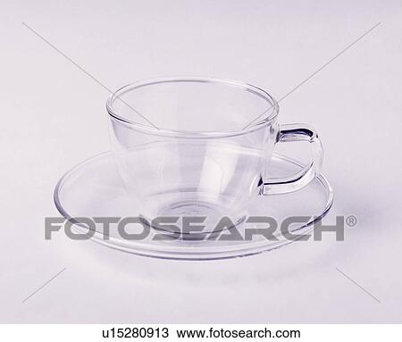 Close-up of glass cup and saucer View Large Photo Image Stock Image - Close-up of glass cup and saucer. Fotosearch