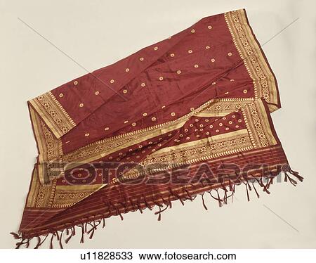 Close-up of gold and rust-coloured Indian silk throw View Large Photo Image Stock Image - Close-up of gold and rust-coloured Indian silk throw. Fotosearch