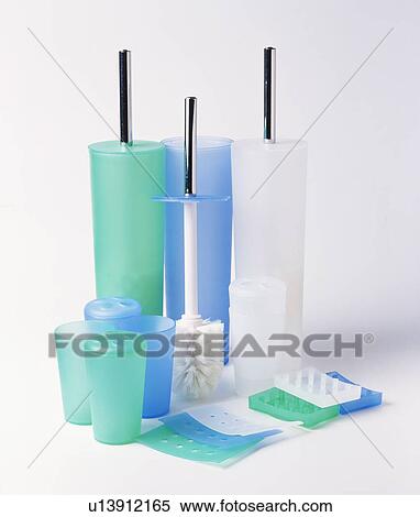 Close-up of green, blue and white plastic toilet-brush holders with matching tooth-mugs View Large Photo Image Stock Photography - Close-up of green, blue and white plastic toilet-brush holders with matching tooth-mugs. Fotosearch