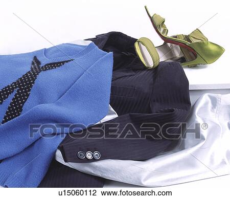 Close-up of green satin stiletto shoes with blue sweater and black corduroy jacket View Large Photo Image Stock Image - Close-up of green satin stiletto shoes with blue sweater and black corduroy jacket. Fotosearch