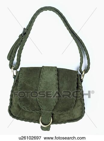 Stock Photo - Close-up of green suede handbag. Fotosearch