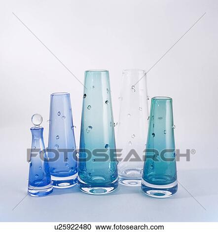 Close-up of group of blue and turquoise decorative glass vases View Large Photo Image Stock Image - Close-up of group of blue and turquoise decorative glass vases. Fotosearch