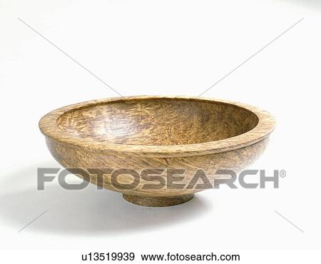 Stock Photo - Close-up of hand-made wooden bowl. Fotosearch