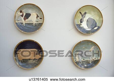 Stock Photography - Close-up of hand-painted animal plates. Fotosearch
