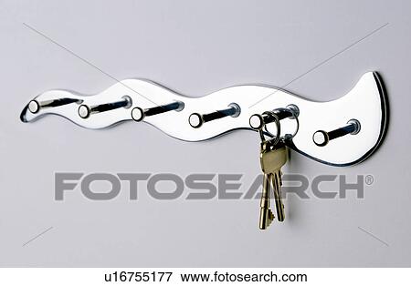 Close-up of keys on metal key-rack View Large Photo Image Stock Photo - Close-up of keys on metal key-rack. Fotosearch