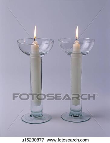 lighted candle sticks