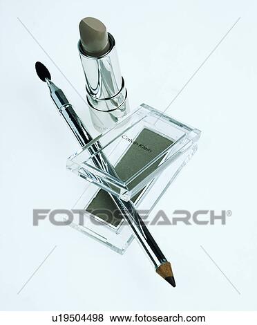 Close-up of lipstick with clear perspex box of Calvin Klein eye-shadow and brush View Large Photo Image Stock Photo - Close-up of lipstick with clear perspex box of Calvin Klein eye-shadow and brush. Fotosearch