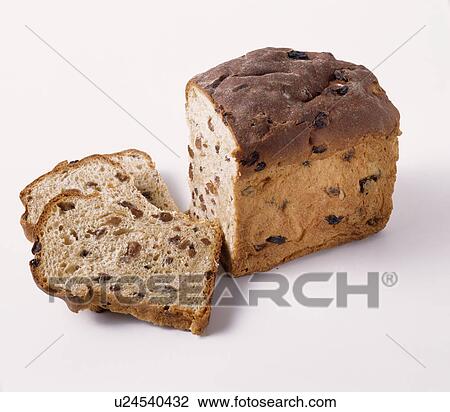 Close-up of loaf of currant bread and two slices View Large Photo Image Stock Image - Close-up of loaf of currant bread and two slices. Fotosearch