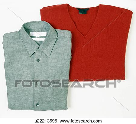 Close-up of man's red wool V-neck jumper and grey wool shirt View Large Photo Image Stock Photography - Close-up of man's red wool V-neck jumper and grey wool shirt. Fotosearch