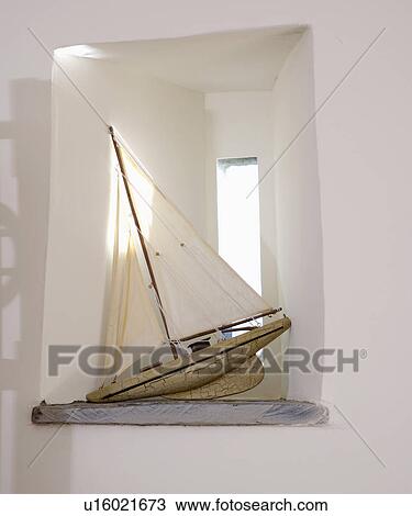 Close-up of model sailing ship on recessed window View Large Photo Image Stock Image - Close-up of model sailing ship on recessed window. Fotosearch