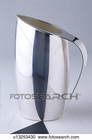 Close-up of modern stainless-steel jug View Large Photo Image Stock Image - Close-up of modern stainless-steel jug. Fotosearch
