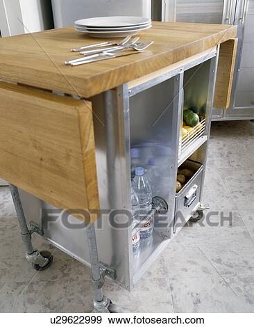 Close-up of movable island unit with storage and shelving View Large Photo Image Stock Photo - Close-up of movable island unit with storage and shelving. Fotosearch