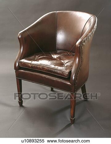 Close-up of old brown leather armchair View Large Photo Image Stock Photography - Close-up of old brown leather armchair. Fotosearch