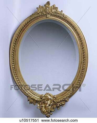 Close-up of ornate gilt-framed mirror View Large Photo Image Stock Image - Close-up of ornate gilt-framed mirror. Fotosearch