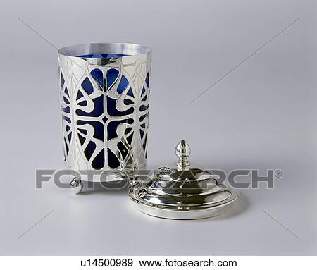 Close-up of ornate silver candle-holder with lid View Large Photo Image Stock Photo - Close-up of ornate silver candle-holder with lid. Fotosearch