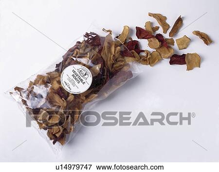 Stock Photo - Close-up of packet of dried vegetable crisps. Fotosearch