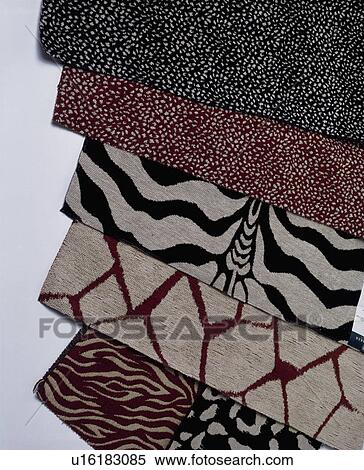 Stock Photography - Close-up of patterned carpet swatches. Fotosearch