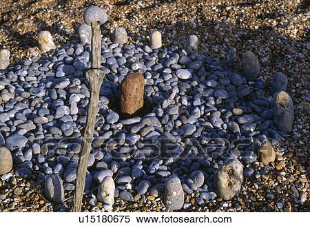 Stock Photography - Close-up of pebbles edged with smooth stones. Fotosearch