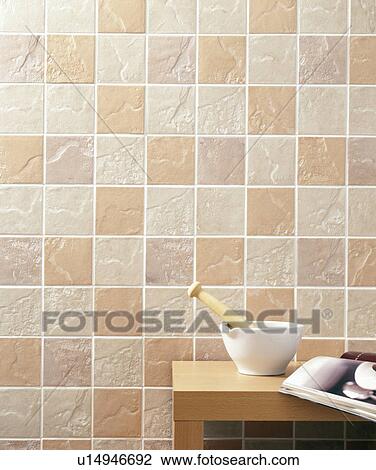 Close-up of pestle+mortar on small table in front of beige and cream tiled wall View Large Photo Image Stock Image - Close-up of pestle+mortar on small table in front of beige and cream tiled wall. Fotosearch