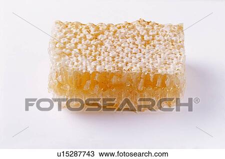 Close-up of piece of honeycomb View Large Photo Image Stock Image - Close-up of piece of honeycomb. Fotosearch
