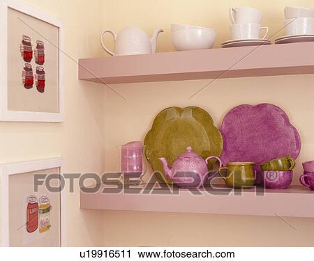 Close-up of pink teapot with pink and green plates on pink shelves View Large Photo Image Stock Image - Close-up of pink teapot with pink and green plates on pink shelves. Fotosearch