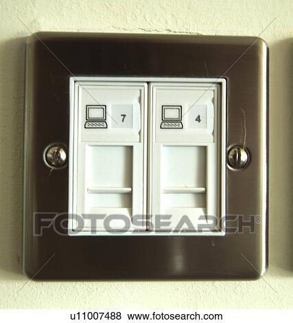 Close-up of plug-point for computer cable View Large Photo Image Stock Photo - Close-up of plug-point for computer cable. Fotosearch