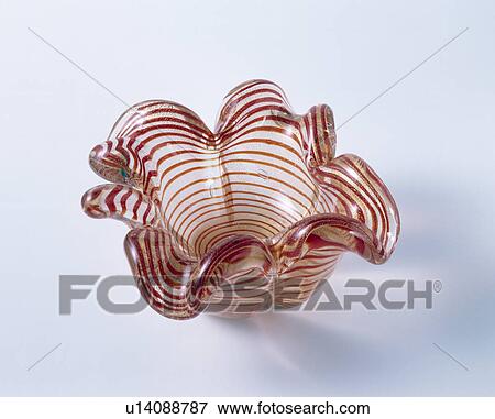 Close-up of red striped heavy glass ornamental dish View Large Photo Image Stock Photo - Close-up of red striped heavy glass ornamental dish. Fotosearch