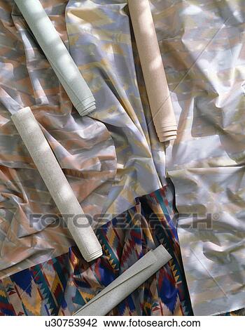 Close-up of rolls of subtly patterned wallpaper View Large Photo Image Stock Image - Close-up of rolls of subtly patterned wallpaper. Fotosearch