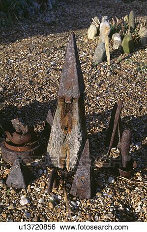 Stock Photograph - Close-up of rusty metal pyramids forming novelty artwork. Fotosearch