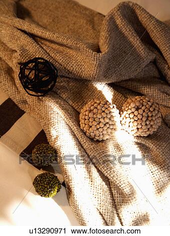 Close up of seedheads on neutral cotton fabric View Large Photo Image Stock Image - Close up of seedheads on neutral cotton fabric. Fotosearch