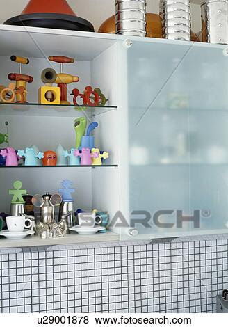 Close-up of shelves with colourful Alessi utensils View Large Photo Image Stock Photo - Close-up of shelves with colourful Alessi utensils. Fotosearch