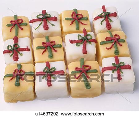 Close-up of small iced cakes decorated with red and green icing View Large Photo Image Stock Image - Close-up of small iced cakes decorated with red and green icing. Fotosearch
