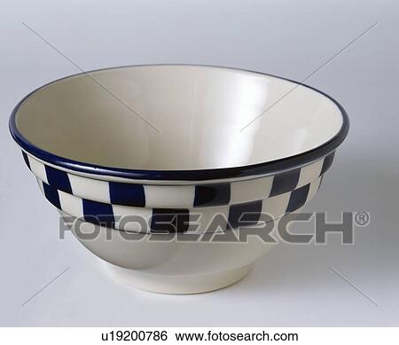 Close-up of small pottery bowl with blue+white border View Large Photo Image Stock Photograph - Close-up of small pottery bowl with blue+white border. Fotosearch
