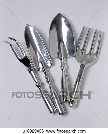 Stock Photograph - Close-up of stainless steel gardening hand-tools. Fotosearch