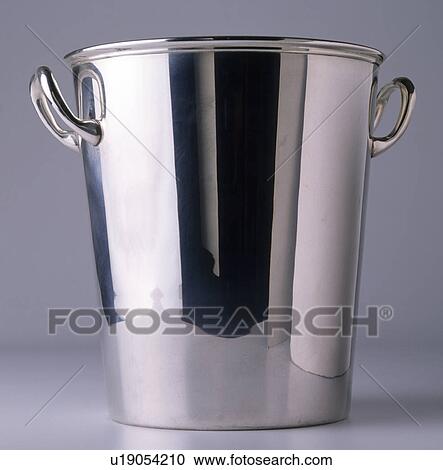 Stock Image - Close-up of stainless-steel ice-bucket. Fotosearch