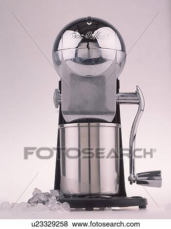 Stock Photo - Close-up of stainless-steel ice-maker. Fotosearch