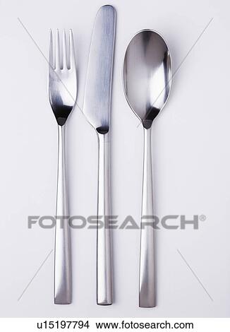 Close-up of stainless-steel knife and fork with spoon View Large Photo Image Picture - Close-up of stainless-steel knife and fork with spoon. Fotosearch