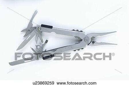 Stock Photo - Close-up of stainless steel multi-tool. Fotosearch