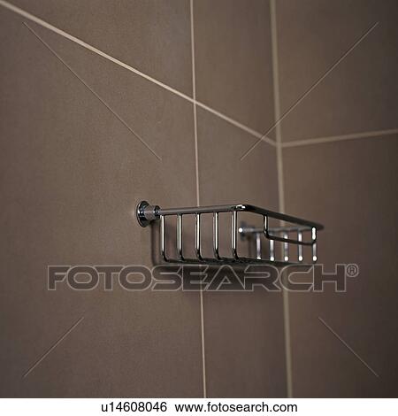Close-up of stainless steel soap rack on brown wall tiles View Large Photo Image Stock Photograph - Close-up of stainless steel soap rack on brown wall tiles. Fotosearch
