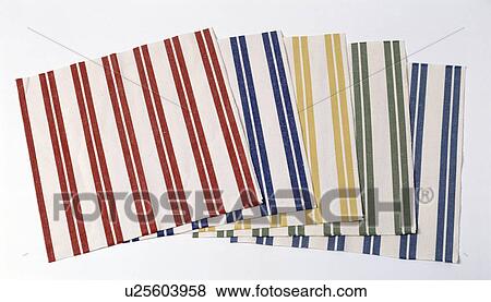 Stock Photo - Close-up of swatches of striped cotton fabric. Fotosearch