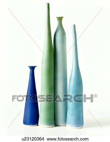 Picture - Close-up of tall and narrow blue and green ceramic vases. Fotosearch