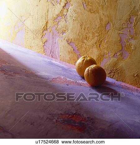close-up of tangerines on rough purple surface with textured yellow and mauve wall in the background View Large Photo Image Stock Photo - close-up of tangerines on rough purple surface with textured yellow and mauve wall in the background. Fotosearch