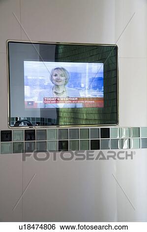 Close-up of television by Aquavision in modern bathroom View Large Photo Image Stock Photograph - Close-up of television by Aquavision in modern bathroom. Fotosearch