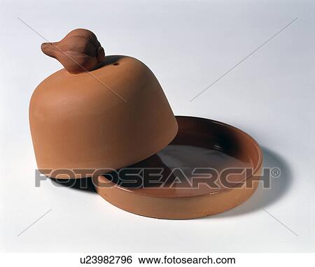 Close-up of terracotta garlic pot View Large Photo Image Stock Photograph - Close-up of terracotta garlic pot. Fotosearch