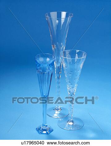 Close-up of three champagne flutes View Large Photo Image Stock Image - Close-up of three champagne flutes. Fotosearch