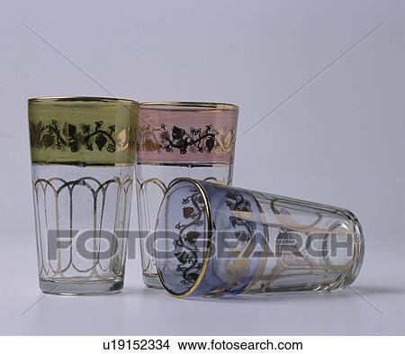 Close-up of three gold-decorated Moroccan tea glasses View Large Photo Image Picture - Close-up of three gold-decorated Moroccan tea glasses. Fotosearch
