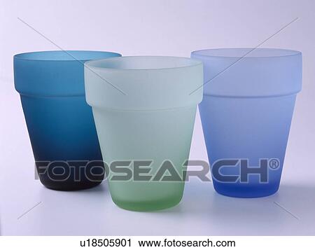 Close-up of three green and blue opaque glass pots View Large Photo Image Stock Image - Close-up of three green and blue opaque glass pots. Fotosearch