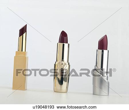 Close-up of three lipsticks View Large Photo Image Stock Image - Close-up of three lipsticks. Fotosearch