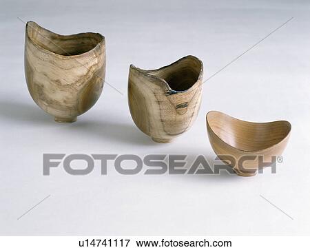 Close-up of three small hand-made wooden bowls View Large Photo Image Stock Photo - Close-up of three small hand-made wooden bowls. Fotosearch