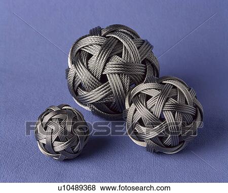 Close-up of three woven steel balls View Large Photo Image Stock Photo - Close-up of three woven steel balls. Fotosearch